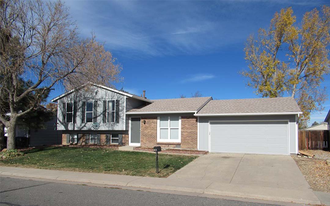 Denver Single-family split-level home with garage and front yard.